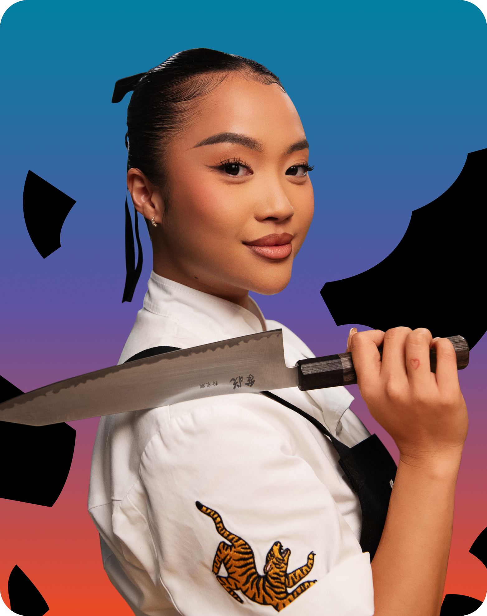 Portrait of a chef tue nguyen in a white jacket holding a large chef’s knife over her shoulder, set against a blue-to-orange gradient background with abstract black shapes.